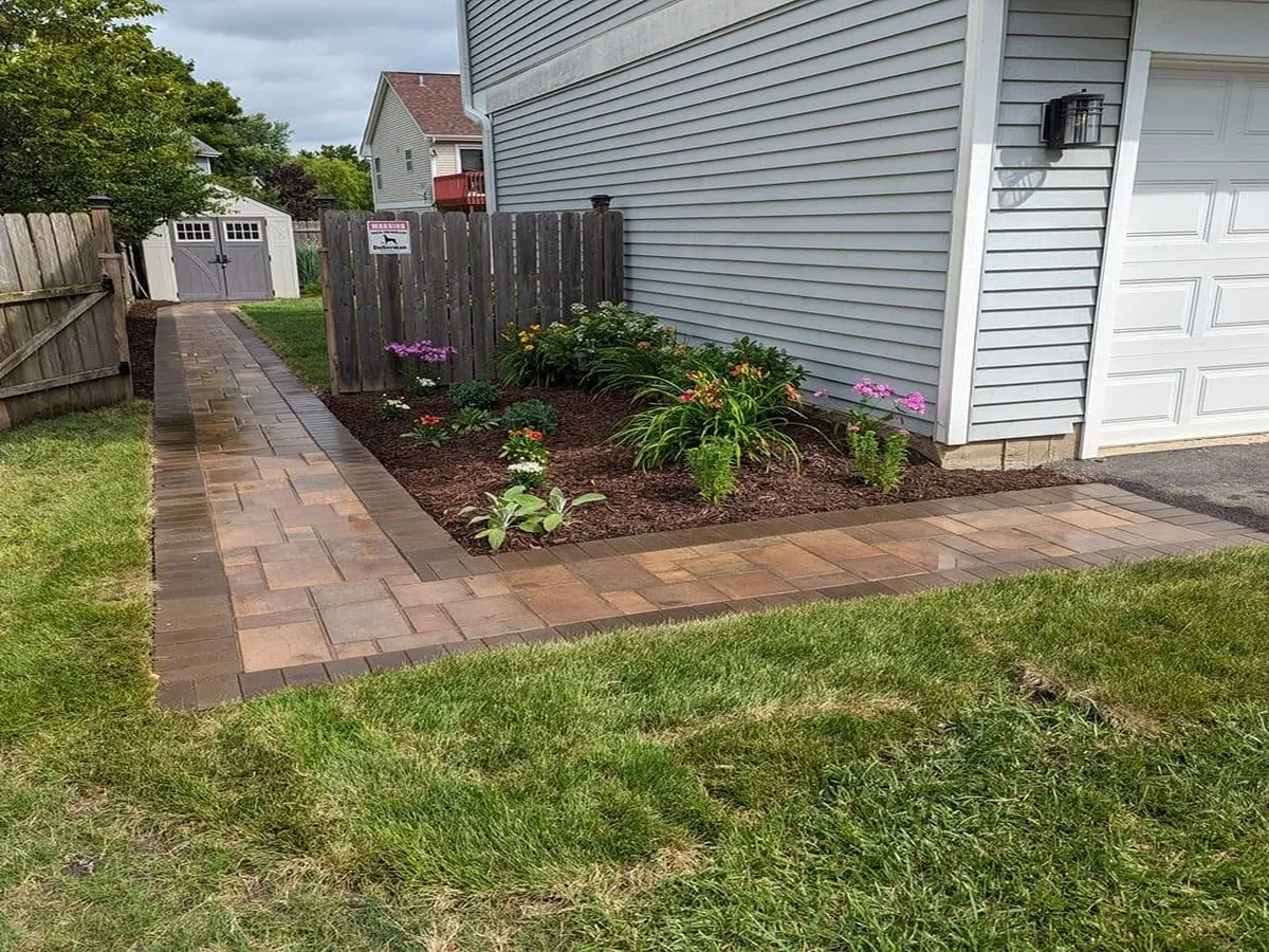 Paver walkway leading up to a home entrance